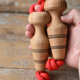 Mader Kreiselmanufaktur Children's Skipping Rope with Natural Handles in an adult hand.