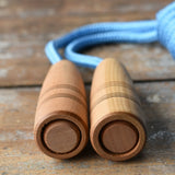 Close up of the bottom of the handles on the Mader Kreiselmanufaktur Skipping Rope Natural Handles 5m length.