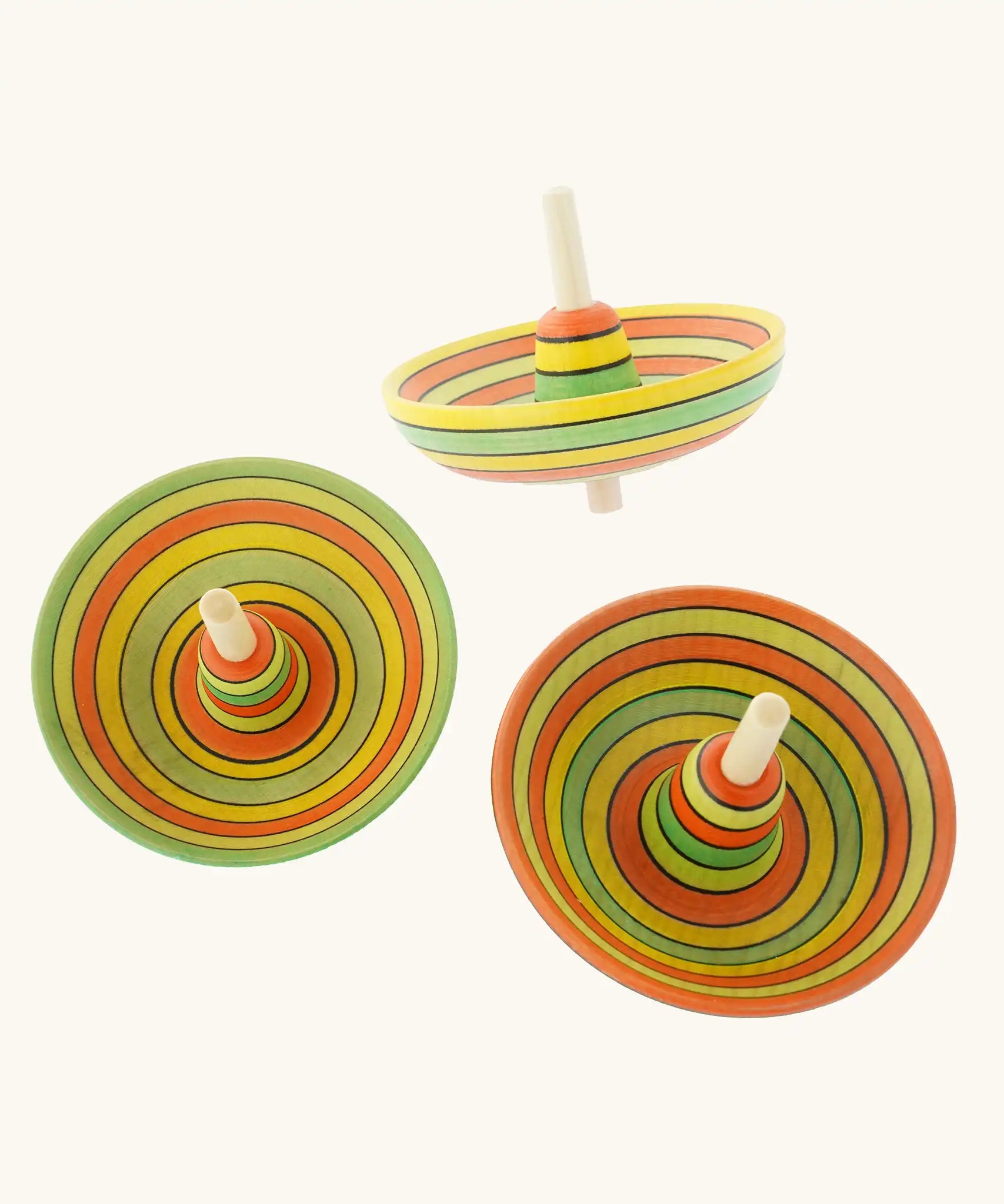 Three Mader Kreiselmanufaktur Sombrero Spinning Tops with a Summer stripe design.