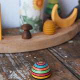 Mader striped wooden magnet placed on a desk in the Babipur playroom.
