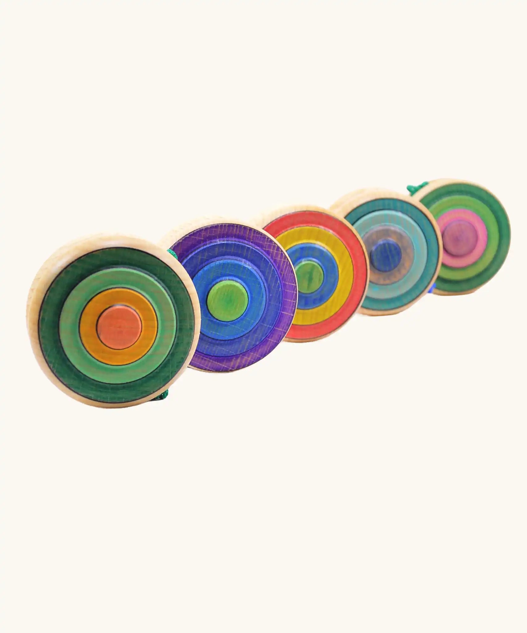 Five Mader Kreiselmanufaktur yoyo harlequin in various colours.