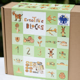 Close up of the front of the Magic Wood Eco Blocks Big Box 70 piece set box showing some build ideas.
