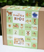 Close up of the front of the Magic Wood Eco Blocks Big Box 70 piece set box showing some build ideas.