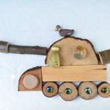 Tank flatlay created using pieces from the Magic Wood Eco Blocks Big Box 70 piece set. Decorated with flat marbles, Nins,  Holztiger duck and Grapat pieces.