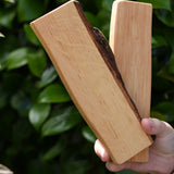 Two rectangular pieces from the Magic Wood Eco Blocks Big Box 70 piece set with nark on teh edges.