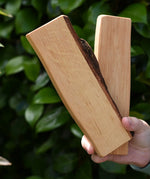 Two rectangular pieces from the Magic Wood Eco Blocks Big Box 70 piece set with nark on teh edges.