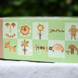 Side of box of the Magic Wood Eco Blocks Big Box 70 piece set showing some build and play ideas. 