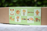 Side of box of the Magic Wood Eco Blocks Big Box 70 piece set showing some build and play ideas. 