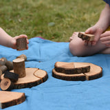 Children playing with pieces from the Magic Wood Eco Blocks Big Box 70 piece set.