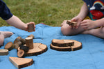 Children playing with pieces from the Magic Wood Eco Blocks Big Box 70 piece set.