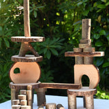 Wooden block structure built using the  Magic Wood oiled ecoBlocks 36 piece set.