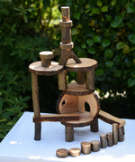 Magic Wood oiled ecoBlocks in a 36 piece set used to build a structure. 