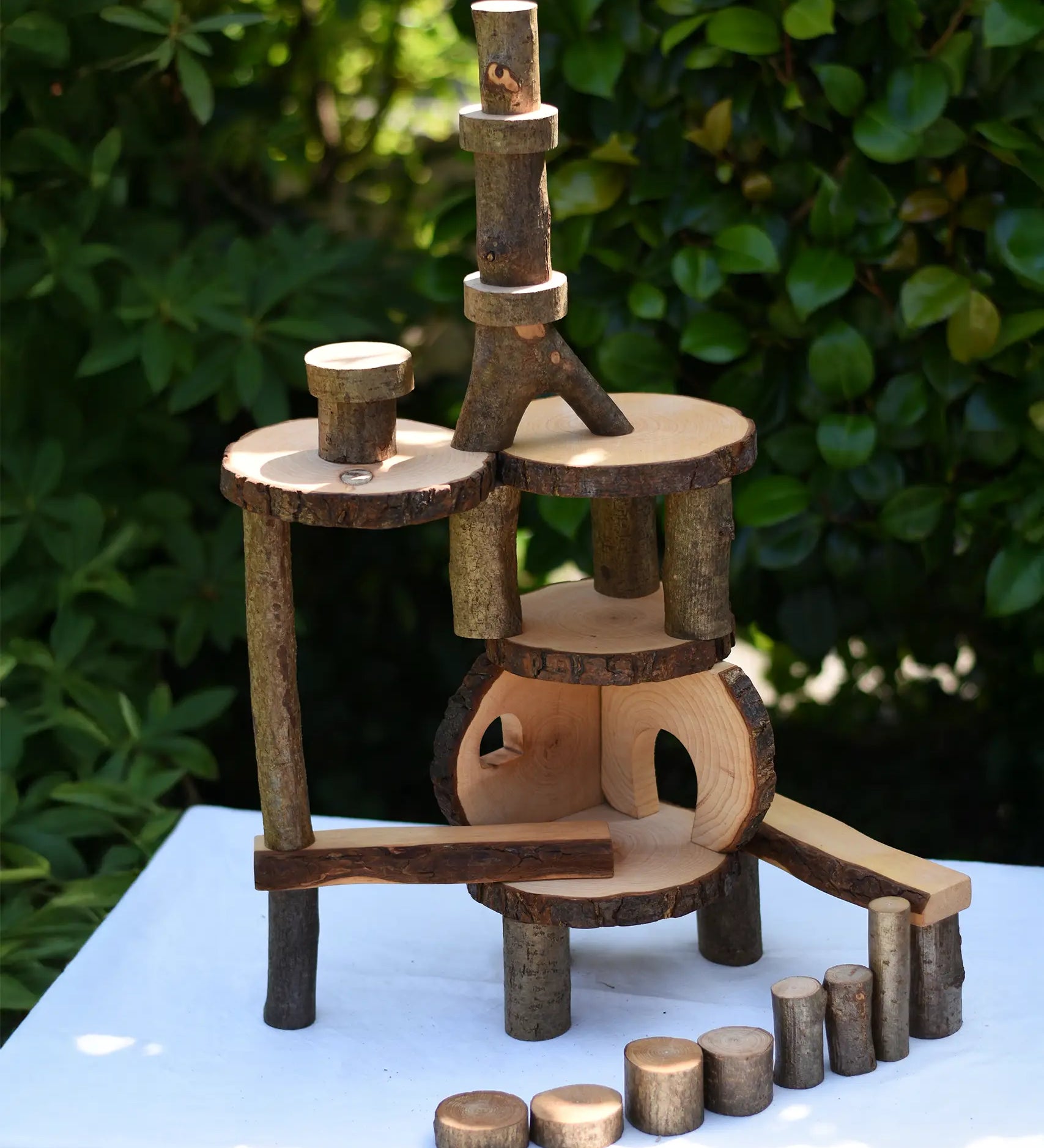 Magic Wood oiled ecoBlocks in a 36 piece set used to build a structure. 