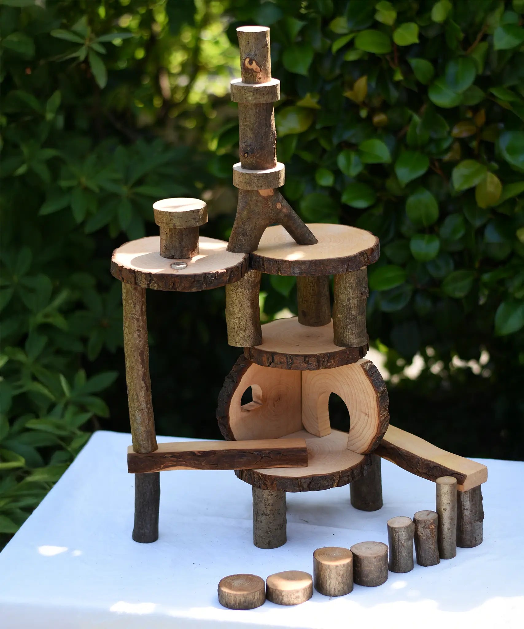 Magic Wood oiled ecoBlocks in a 36 piece set used to build a structure. 