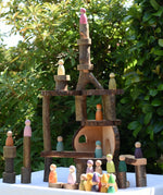  Tall building created using the Magic Wood oiled ecoBlocks 36 piece set with Grapat Nins and Grimm's friends placed on it.
