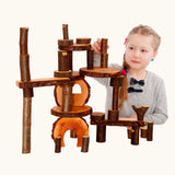 Child building with the  Magic Wood oiled ecoBlocks 36 piece set.