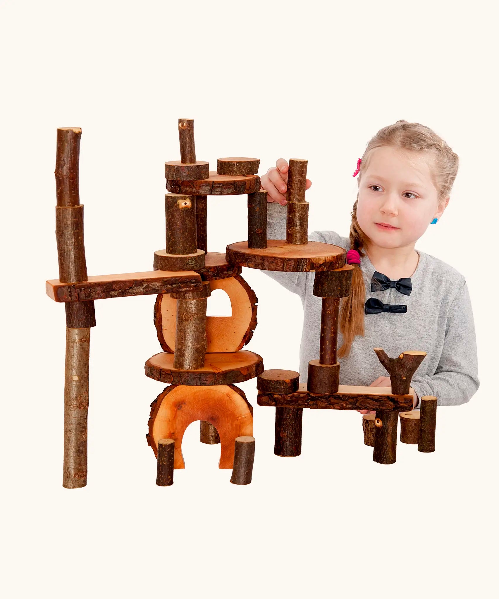 Child building with the  Magic Wood oiled ecoBlocks 36 piece set.