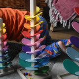 The small Magic Wood marble tree placed on the floor the mini and large marble trees can be seen just off to the side.