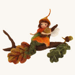 The Makerss Official Flower Fairies™️ acorn fairy needle felt kit finished product on a plain background.
