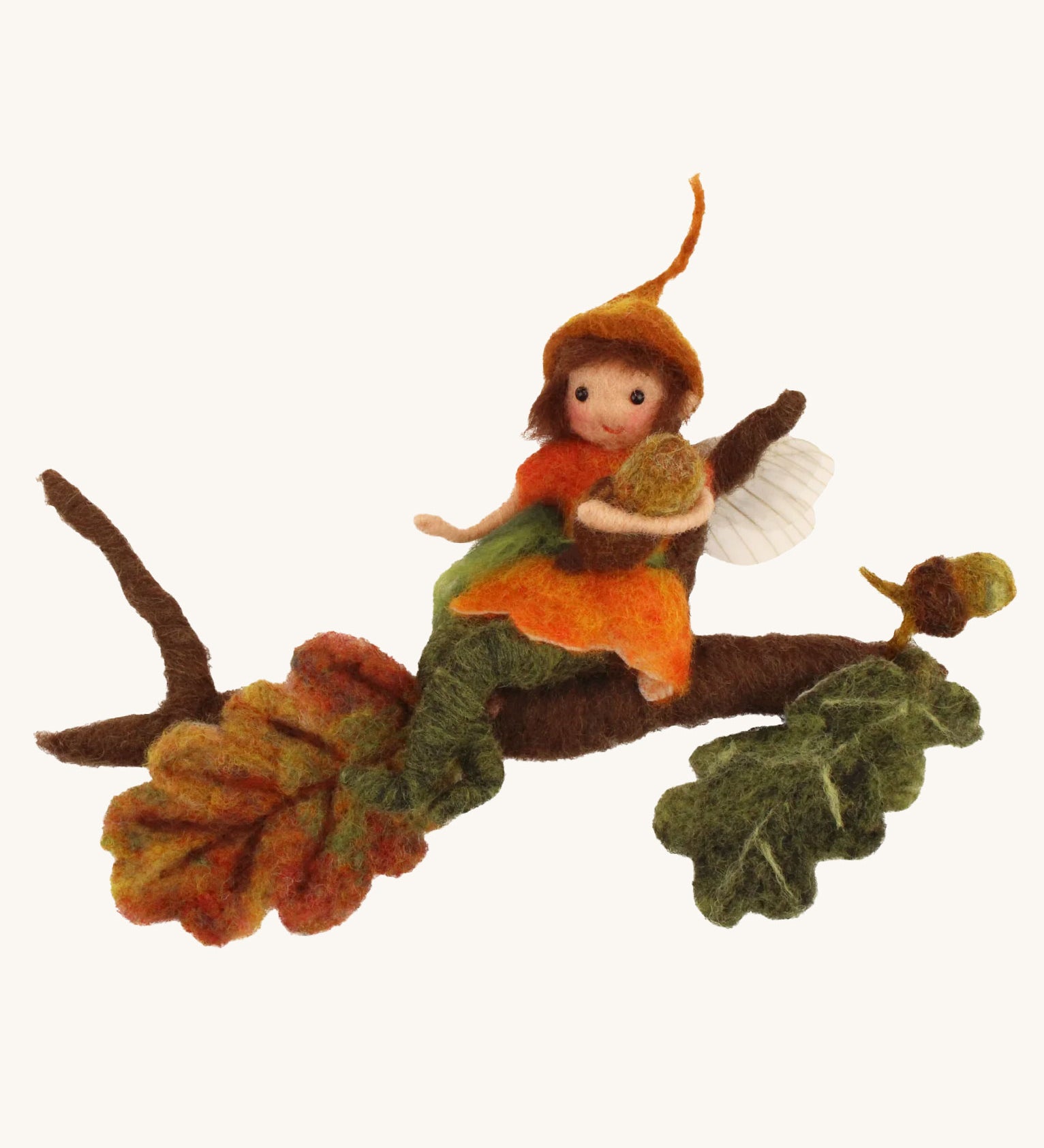 The Makerss Official Flower Fairies™️ acorn fairy needle felt kit finished product on a plain background.