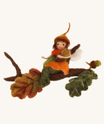 The Makerss Official Flower Fairies™️ acorn fairy needle felt kit finished product on a plain background.