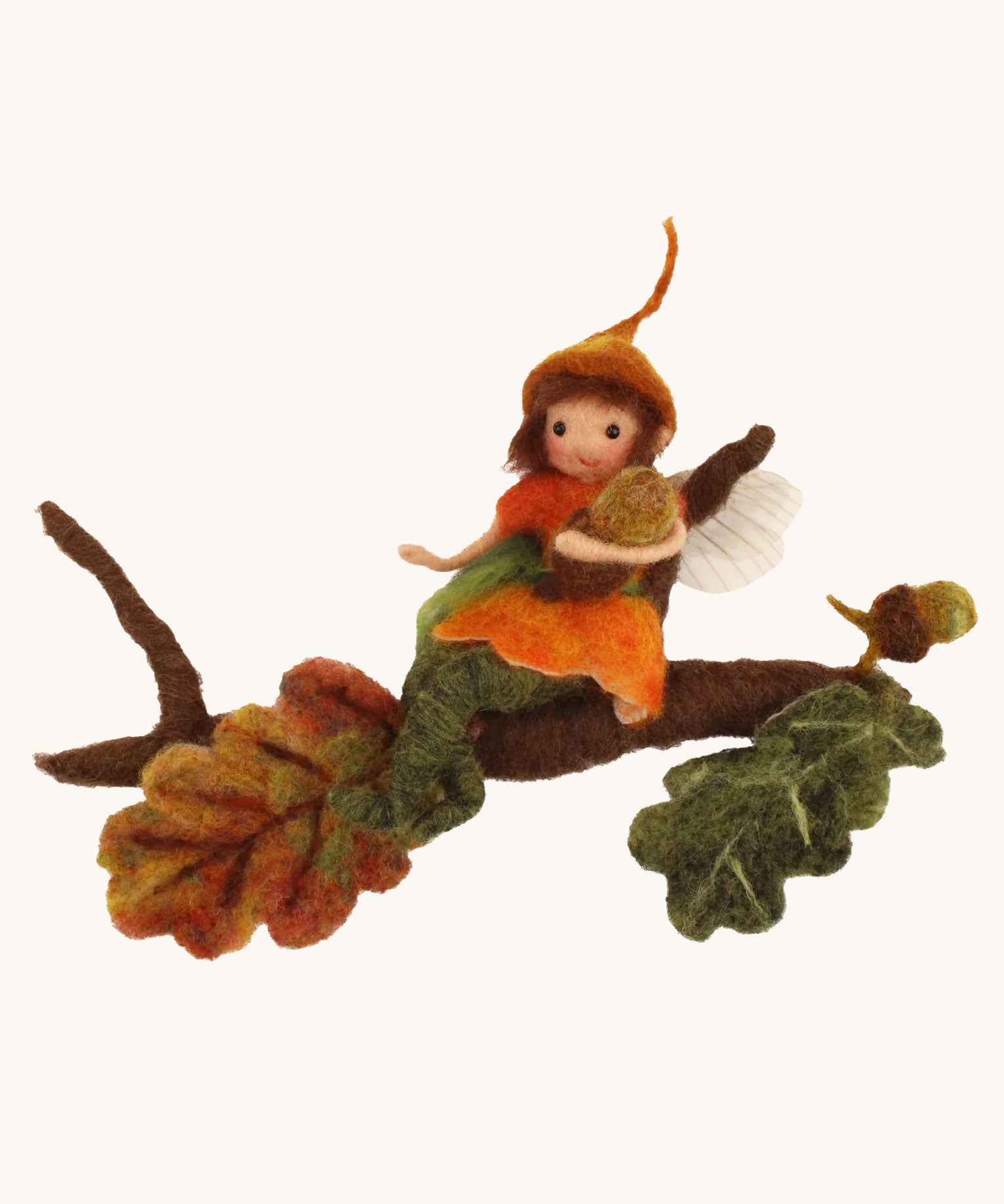 The Makerss Official Flower Fairies™️ acorn fairy needle felt kit finished product on a plain background.