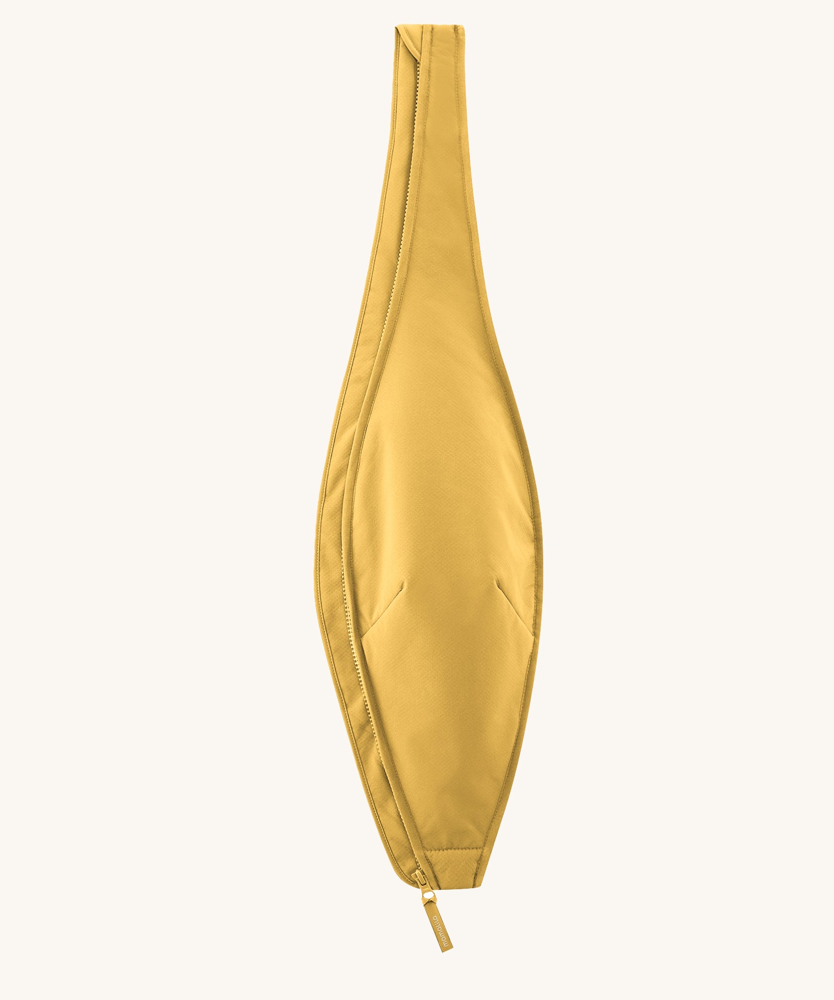 The pregnancy insert from the Mamalila Allweather Cosy Allrounder Babywearing Jacket in a Mustard yellow colour shown on it's own.