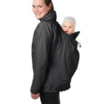 A person wearing the Mamalila Outdoor Explorer Babywearing Jacket - Black