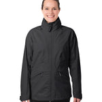 A person wearing the Mamalila Outdoor Explorer Babywearing Jacket - Black