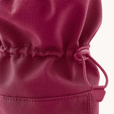 A close up of the Mamalila  toddler allrounder winter booties in the berry pink colour available at Babipur showing the toggle detail