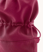 A close up of the Mamalila  toddler allrounder winter booties in the berry pink colour available at Babipur showing the toggle detail