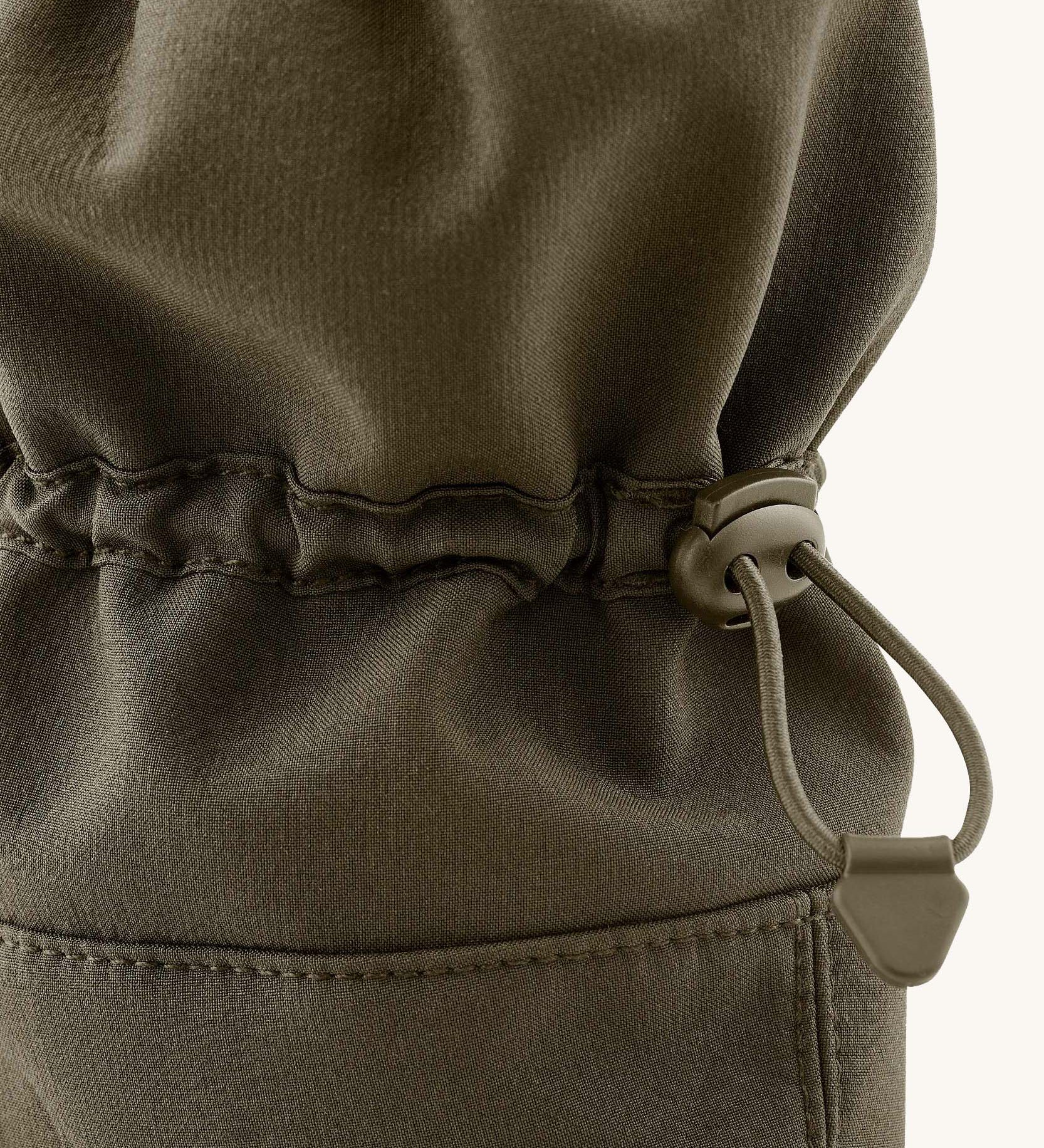 A close up of the Mamalila  toddler allrounder winter booties in the khaki green colour available at Babipur showing the toggle detail