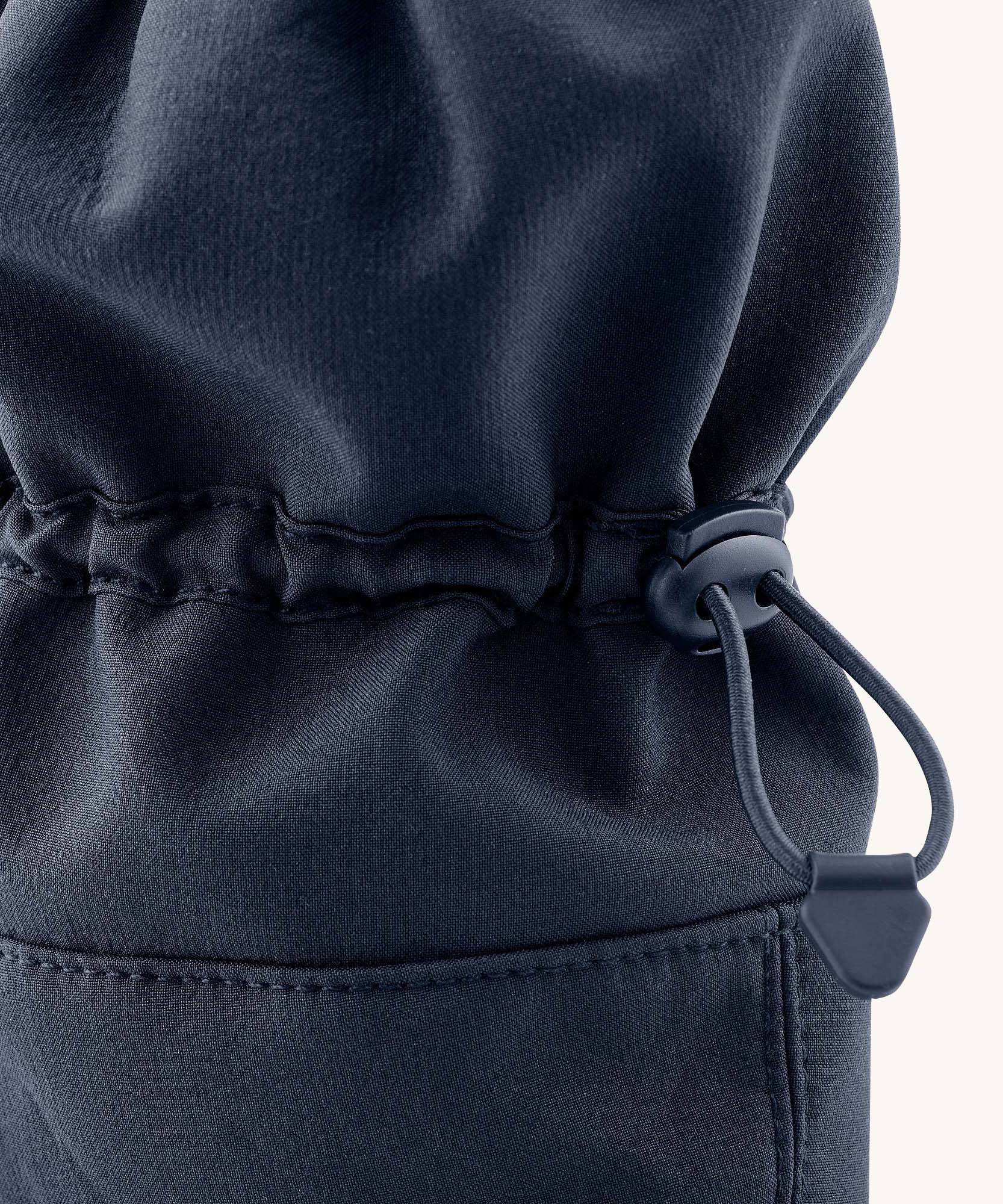 A close up of the Mamalila  toddler allrounder winter booties in the navy blue colour available at Babipur showing the toggle detail