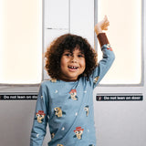 Child wearing the Maxomorra GOTS organic cotton long sleeve top in blue with a cute repeating owl print and brown neck line and cuffs.