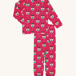 Maxomorra Fairy Long Sleeve Pyjama Set on a plain background. A funall over fairy print on a hot pink background with contrasting purple leg cuffs and collar binding.