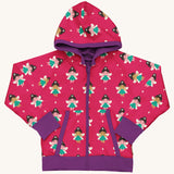 Maxomorra Fairy Reversible Zip Hoodie on a plain background. This hooded zipped cardigan has an all over fairy print on a hot pink background with contrasting purple sleeve trims and hood, zip and pocket bindings.