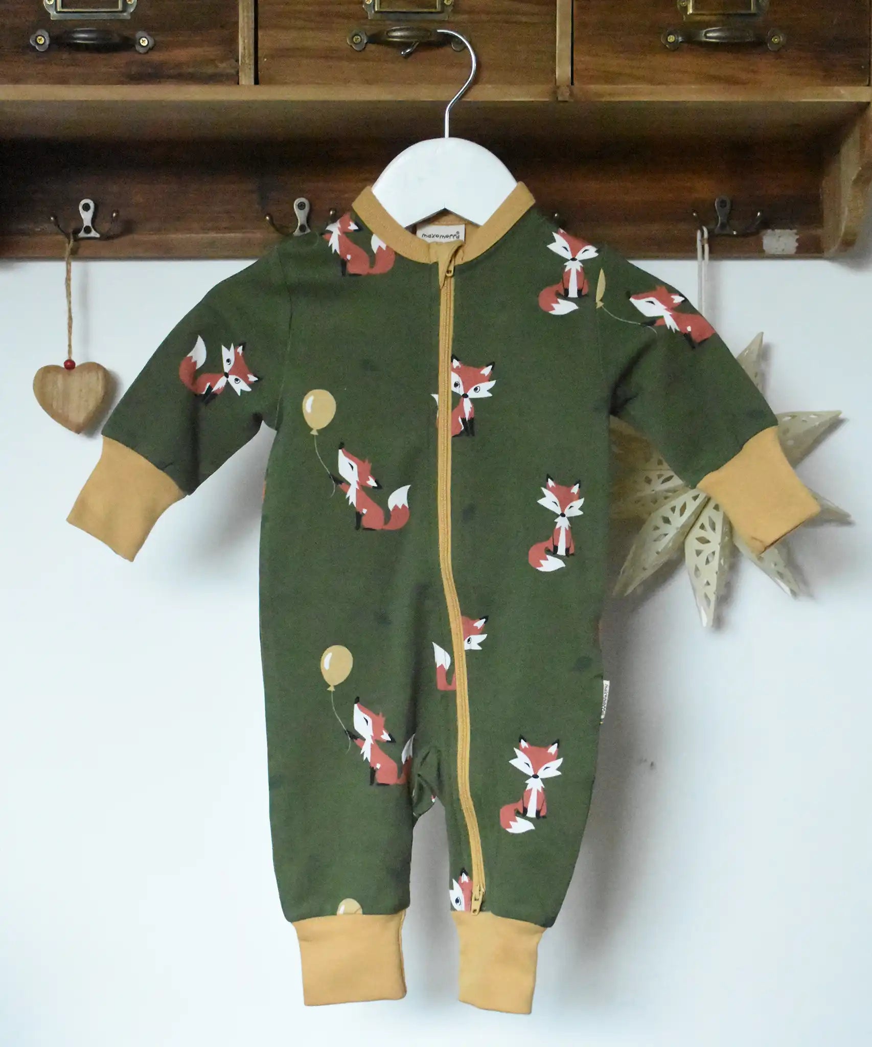 Maxomorra Fox Organic Cotton zip up Babygrow on a hanger. 
