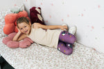 Girl wearing the Maxomorra kids GOTS organic cotton leggings in purple with a repeating cute hedgehog print and elasticated waist band with a cream vest top.
