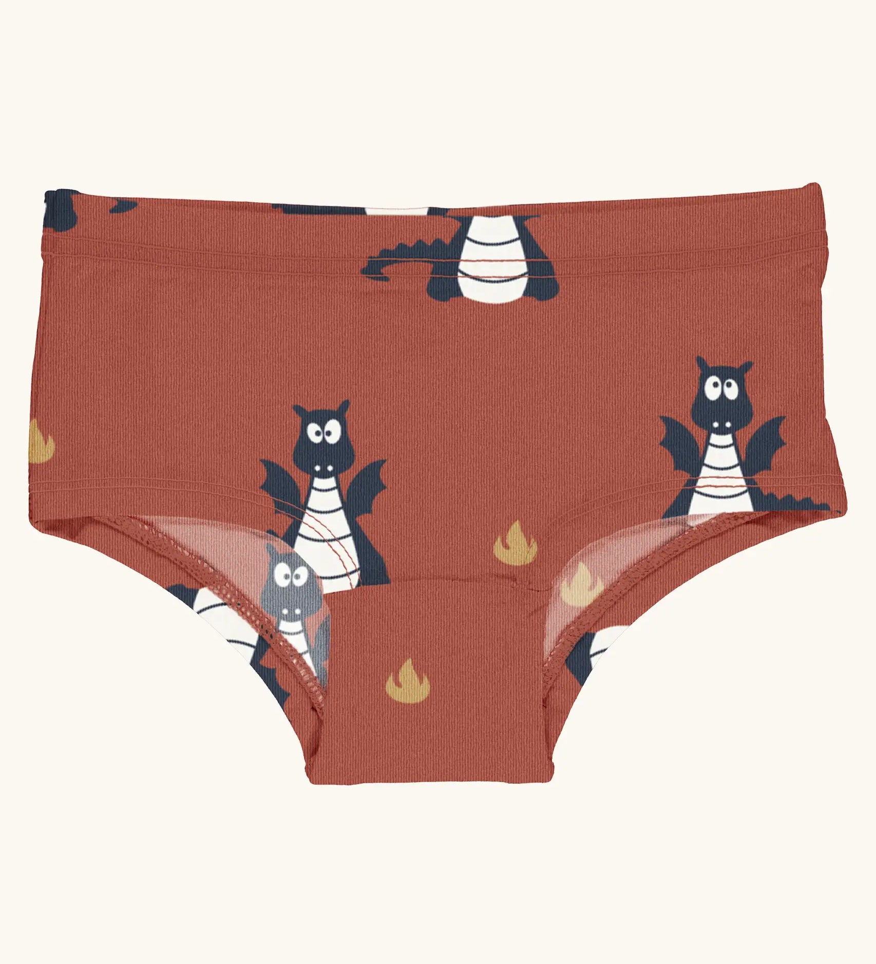 Maxomorra kids GOTS organic cotton brief hipster pants in red with a repeating cartoon style blue dragon print. Features a elasticated waist band.