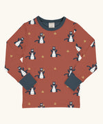 Maxomorra kids dragons organic cotton long sleeve top. Red top with repeat blue dragon print and blue arm cuffs and binding on the neck. 
