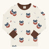 Maxomorra kids vikings organic cotton long sleeve top. Light coloured top with  repeat viking print and contrasting brown arm cuffs and binding on the neck. 
