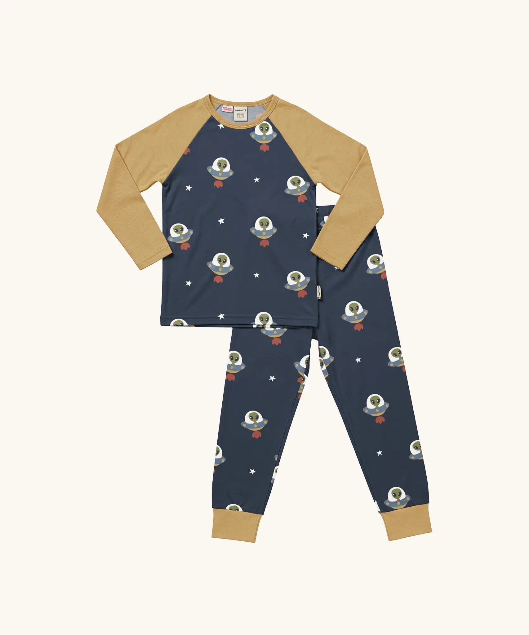 Maxomorra kids organic cotton long sleeved top and trousers pyjama set with ufo print. Blue background with green aliens in a ufo with white stars. The top has yellow block colour arms and neck trim, the trousers have yellow leg cuffs.
