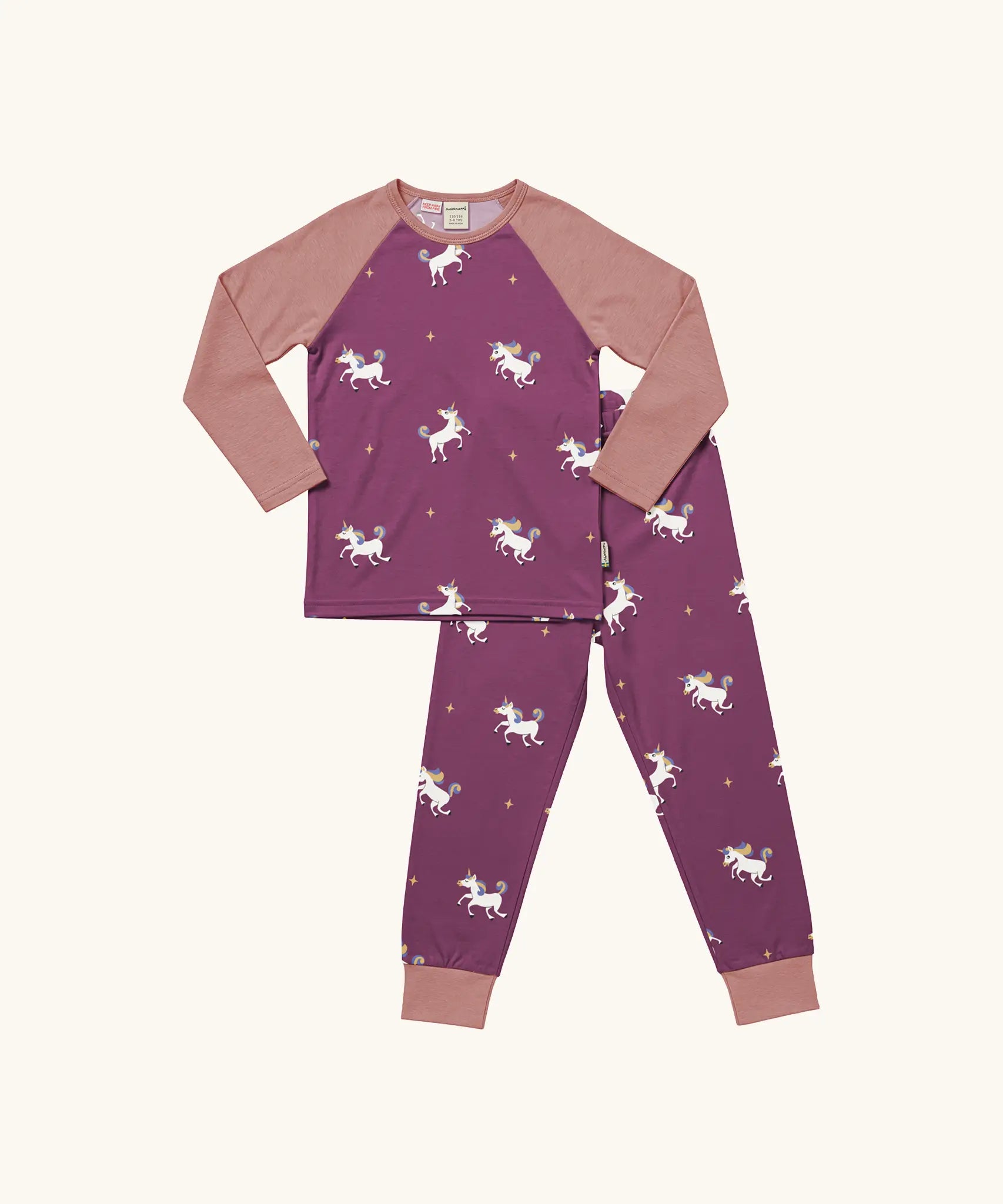 Maxomorra kids organic cotton long sleeved top and trousers pyjama set with unicorns print. Purple background with unicorns with multi coloured manes and yellow sparkles. The top has pink block colour arms and neck trim, the trousers have pink leg cuffs.