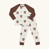 Maxomorra kids organic cotton long sleeved top and trousers pyjama set with vikings print. Light cream background with bearded viking wearing a hat and blue dagger sword outlines. The top has brown block colour arms and neck trim, the trousers have brown leg cuffs.