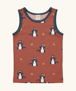 Maxomorra kids dragons organic cotton vest. Red sleeveless vest top with repeat print featuring a blue dragon and yellow fire outlines with blue binding on the neck and arm holes. 

