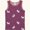 Maxomorra kids unicorns organic cotton vest. Purple sleeveless vest top with repeat unicorn print and light pink binding on the neck and arm holes. 
