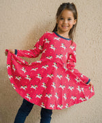 A child wearing a Maxomorra Unicorn Long Sleeve Circle Dress. 