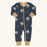 Maxomorra organic cotton zipped babygrow with ufo. Blue background repeat print featuring ufo's with green aliens and white stars with yellow arm cuffs, binding on the neck and zip. 