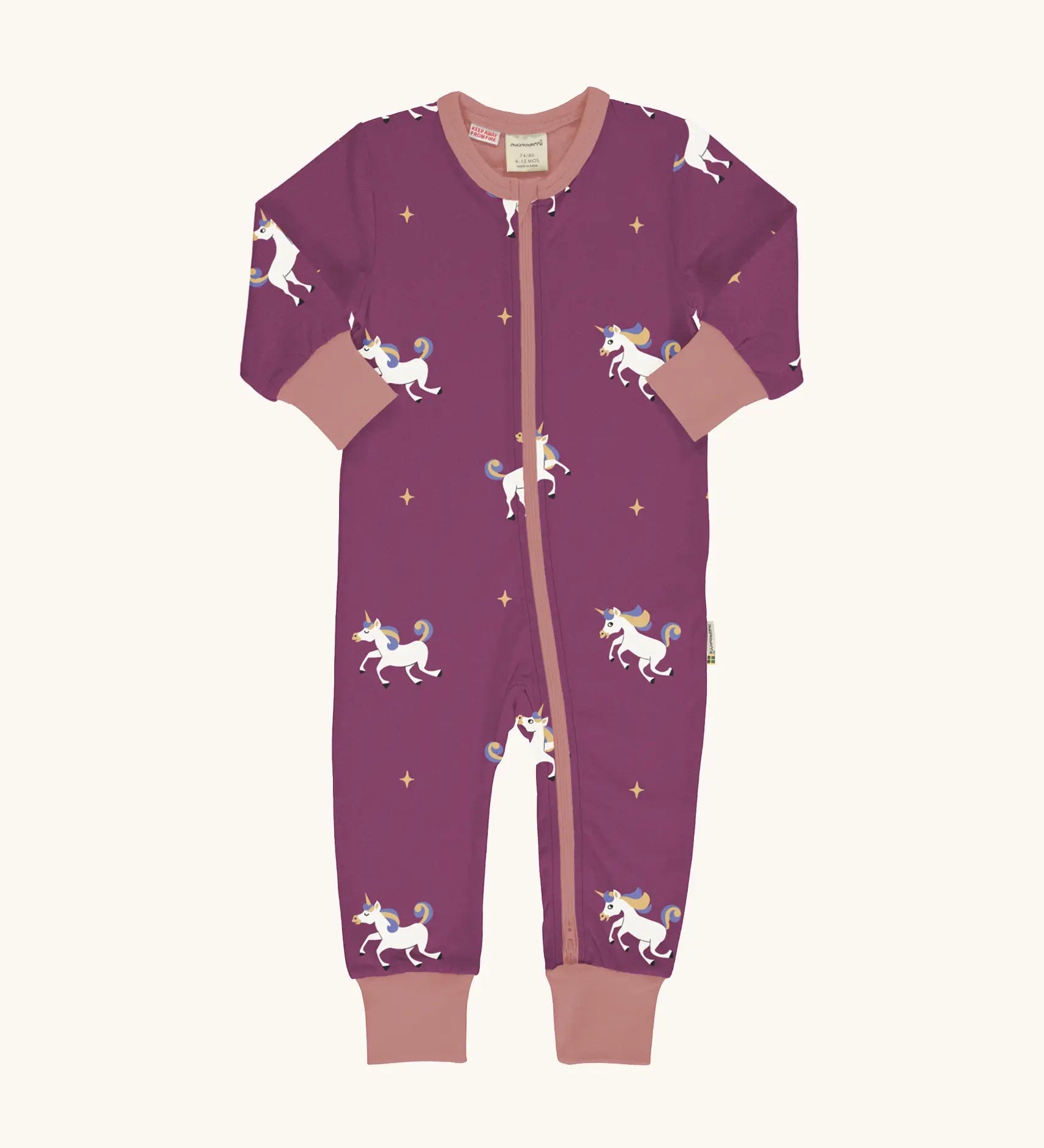 Maxomorra organic cotton zipped babygrow with unicorns. Purple background with repeat print featuring unicorns with multi coloured manes and yellow stars with pink arm cuffs, binding on the neck and zip.