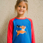 A close up of the reindeer on the Maxomorra Reindeer Raglan Long Sleeve Top. 